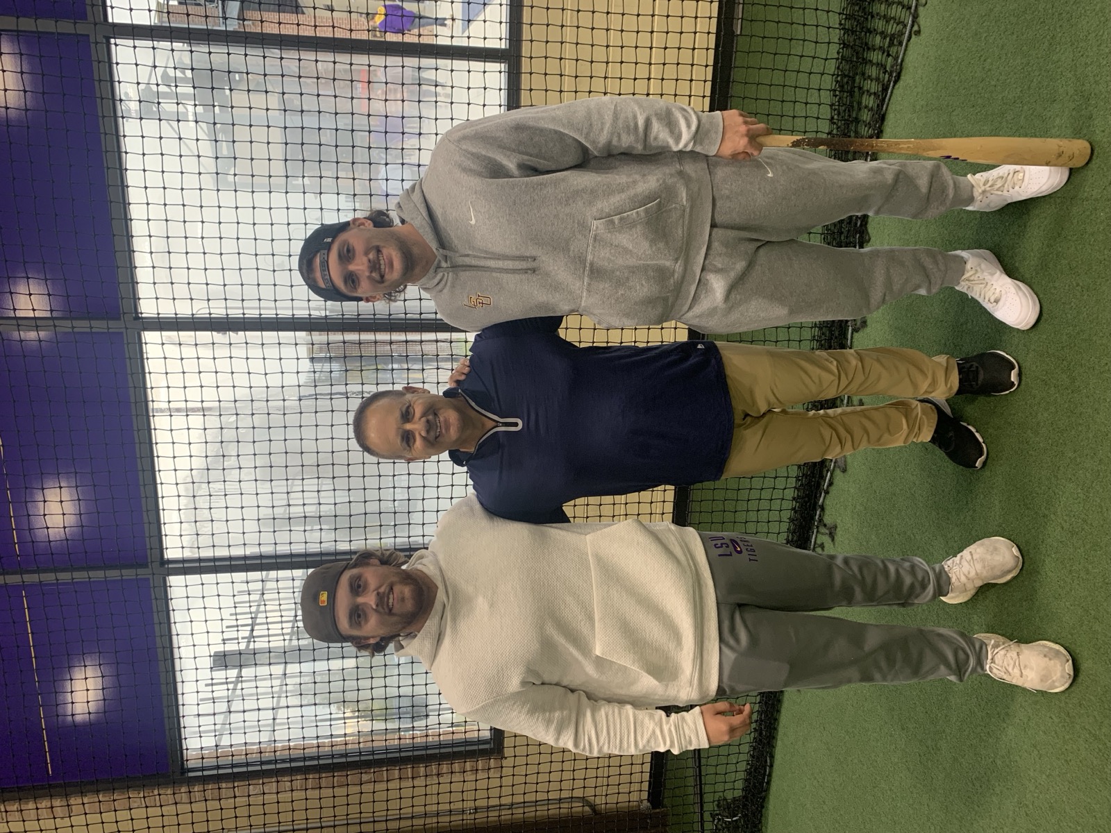 Tony Abbatine with two LSU hitters in the cage
